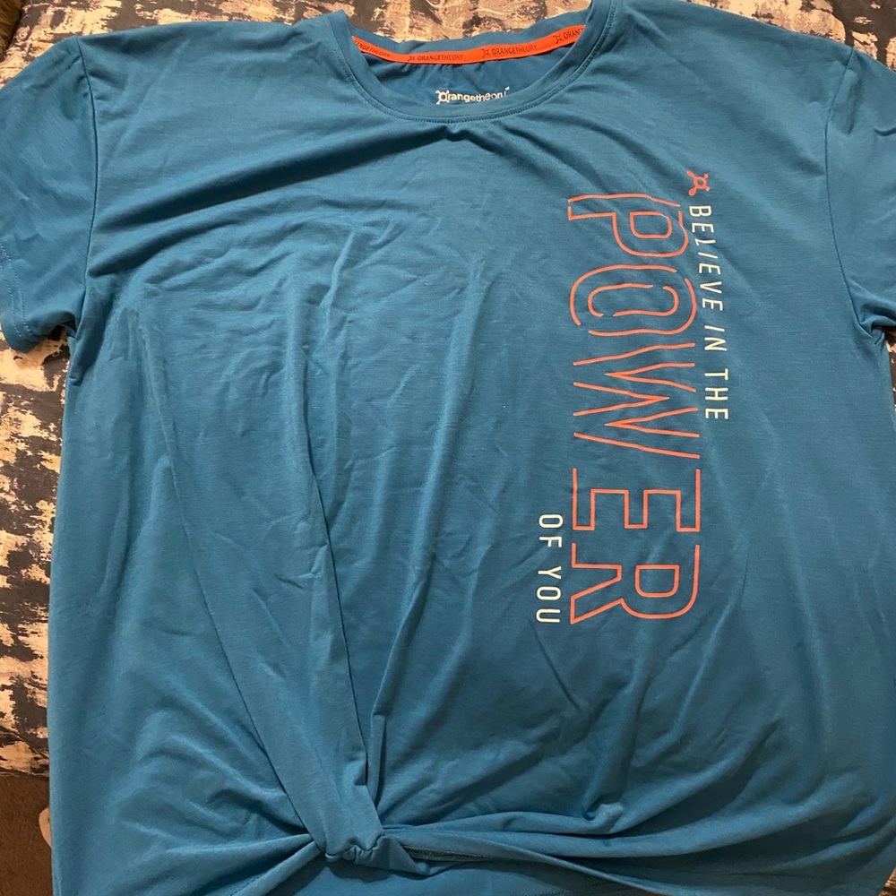 Orange Theory Blue Twist Front Top